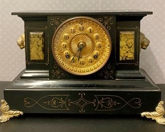 Vintage Ansonia Clocks black with brass lion heads mantel clock