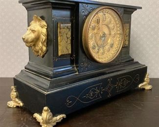 Vintage Ansonia Clocks black with brass lion heads mantel clock