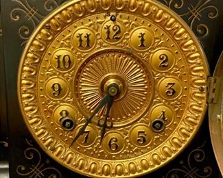 Vintage Ansonia Clocks black with brass lion heads mantel clock