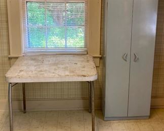 Vintage Cosco folding utility metal table and vintage metal 2-door storage cabinet