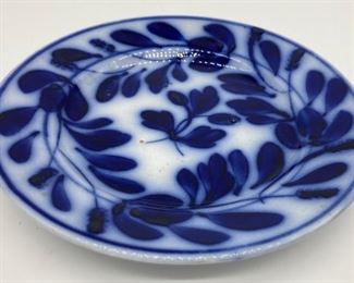 Blue and white floral pottery plate