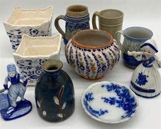 Assorted pottery and ceramic figurines, vases, steins, mugs, jars and bowls