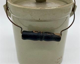 Antique crock with handle and lid