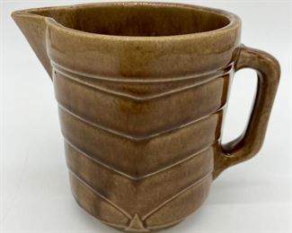 Stoneware glazed pitcher