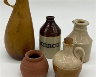 Assorted miniature stoneware jugs and pitchers