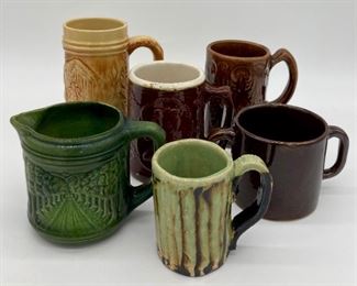Vintage promenade pitcher; Signed drip glaze cup; stoneware two-handled mug; vintage stoneware stein; Crooksville Captain brown mug; stoneware amber large mug