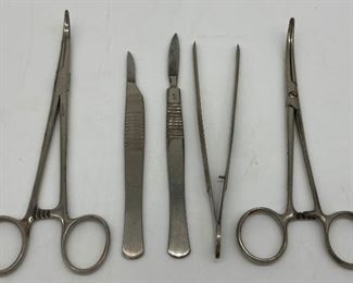 Vintage scapels, tweezers and clamps