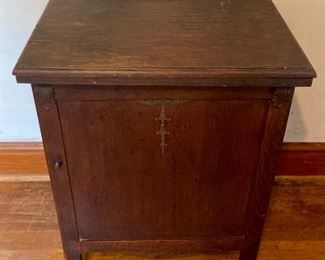 Antique The Free No. 5 sewing machine in oak cabinet