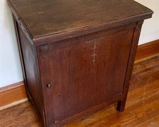 Antique The Free No. 5 sewing machine in oak cabinet