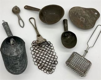 Vintage and antique strainers, scoops, pastry wheel, cast iron skillet and pan cleaner, soap saver