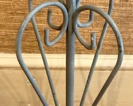 Vintage painted metal plant stands with plastic flower pots