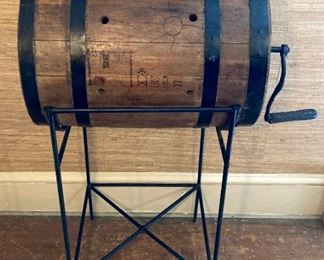 Antique wooden hand crank washing machine with iron stand