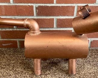 Hand-crafted metal pipe animal art