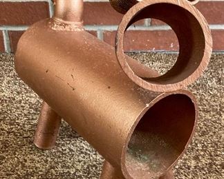 Hand-crafted metal pipe animal art