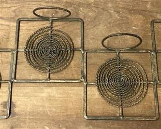 Silver metal indoor/outdoor 4-candle wall hanger