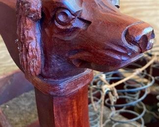 Antique wooden dog handled desk chair on casters