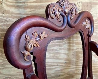 Antique wooden dog handled desk chair on casters