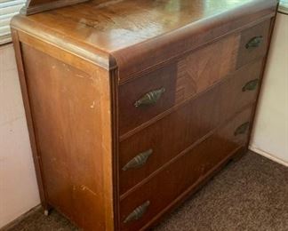 Antique dresser with round mirror