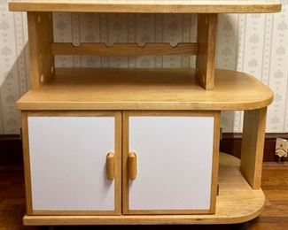 Vintage rolling kitchen island with butcher block top and storage cabinets