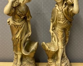 Vintage girl with basket and vintage boy with basket statuettes