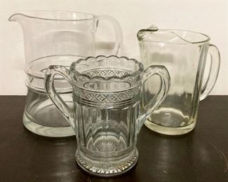 Assorted glass pitchers