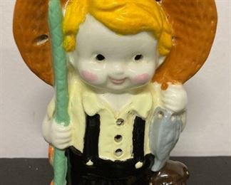 Vintage ceramic farm boy scent releaser figurine
