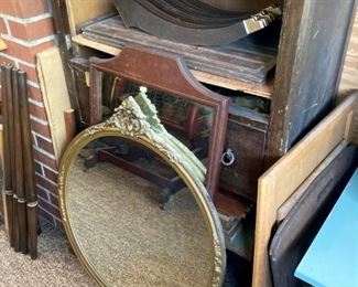 Hollywood Regency round mirror; wood framed mirror