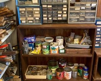 Lots of hardware, nails, screws, brads, nuts, bolts, hinges, locks, etc.