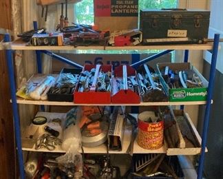 Assorted hand tools: clamps, wrenches, pliers, screwdrivers, ratchets, picks, awls, hammers, mallots, metal brushes, band saws, hand saws, trowels, and more