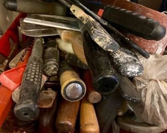 Assorted hand tools: clamps, wrenches, pliers, screwdrivers, ratchets, picks, awls, hammers, mallots, metal brushes, band saws, hand saws, trowels, and more