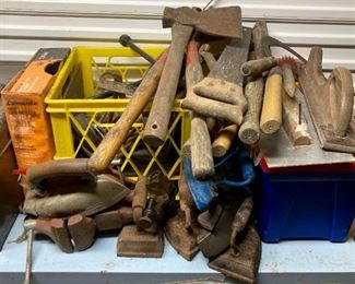 Assorted hand tools including axes, hand saws, clamps, planers, files, etc.