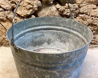 Vintage galvanized metal bucket with handle