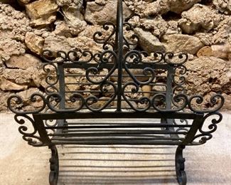Vintage cast iron firewood holder