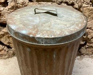 Metal trash can with handle and lid
