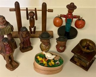 Vintage wooden figurines and daisy coffee grinder