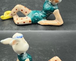 Vintage anthropomorphic reclining rabbit figurine
