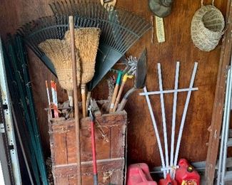 Gas cans, yard tools, metal stakes 