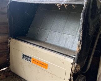 Leaf sweeper for a lawn tractor 