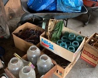 Canning jars, wheel barrow