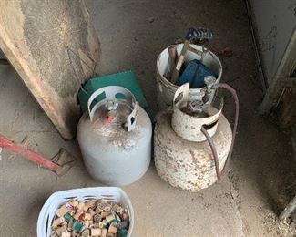 Propane tanks, vintage spools