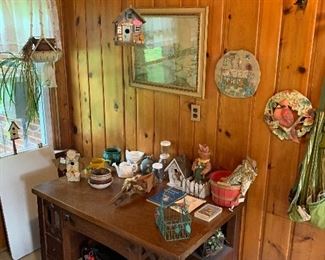 Planters, antique Cadillac desk, plants