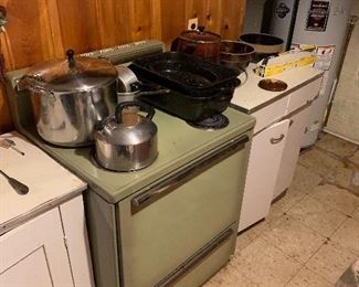 Avocado antique stove, tea kettle, soup pot, vintage cabinets