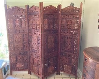 four-panel carved wood screen