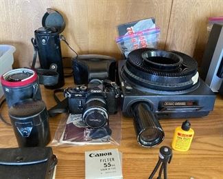 Canon F-1 camera with case and manual, Kodak slide projector