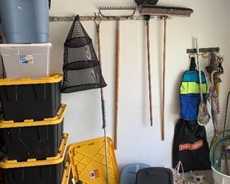 Yard tools, plastic storage bins