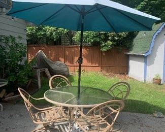Outdoor table and chairs with umbrella