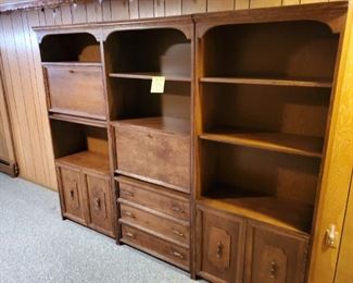 3 individual wood shelving units.