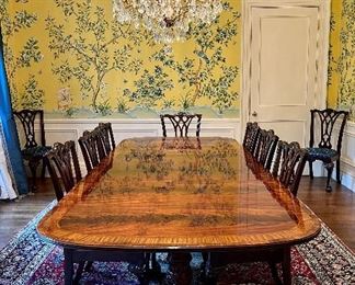 Item 6:  An outstanding Georgian design dining table by Heritage Furniture Heirloom Collection. Features matched flame mahogany with inlaid banding of satinwood, tulipwood, ebony, and rosewood. There are two matching 22" wide leaves which allow the table to expand from 74" to 96" and 118". The solid mahogany pedestals are richly carved. - 117.5"l x 48"w x 30"h & 2 leaves - 22" - This item is being sold WITH the Chairs - will consider splitting them up only on Sunday:  $3400 for table and chairs                                                                     