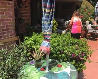 We have two of these tables and umbrellas.  Buy one or both