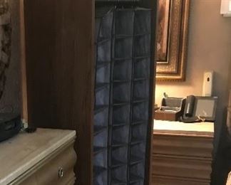 Shoe rack for 125 pairs of shoes.